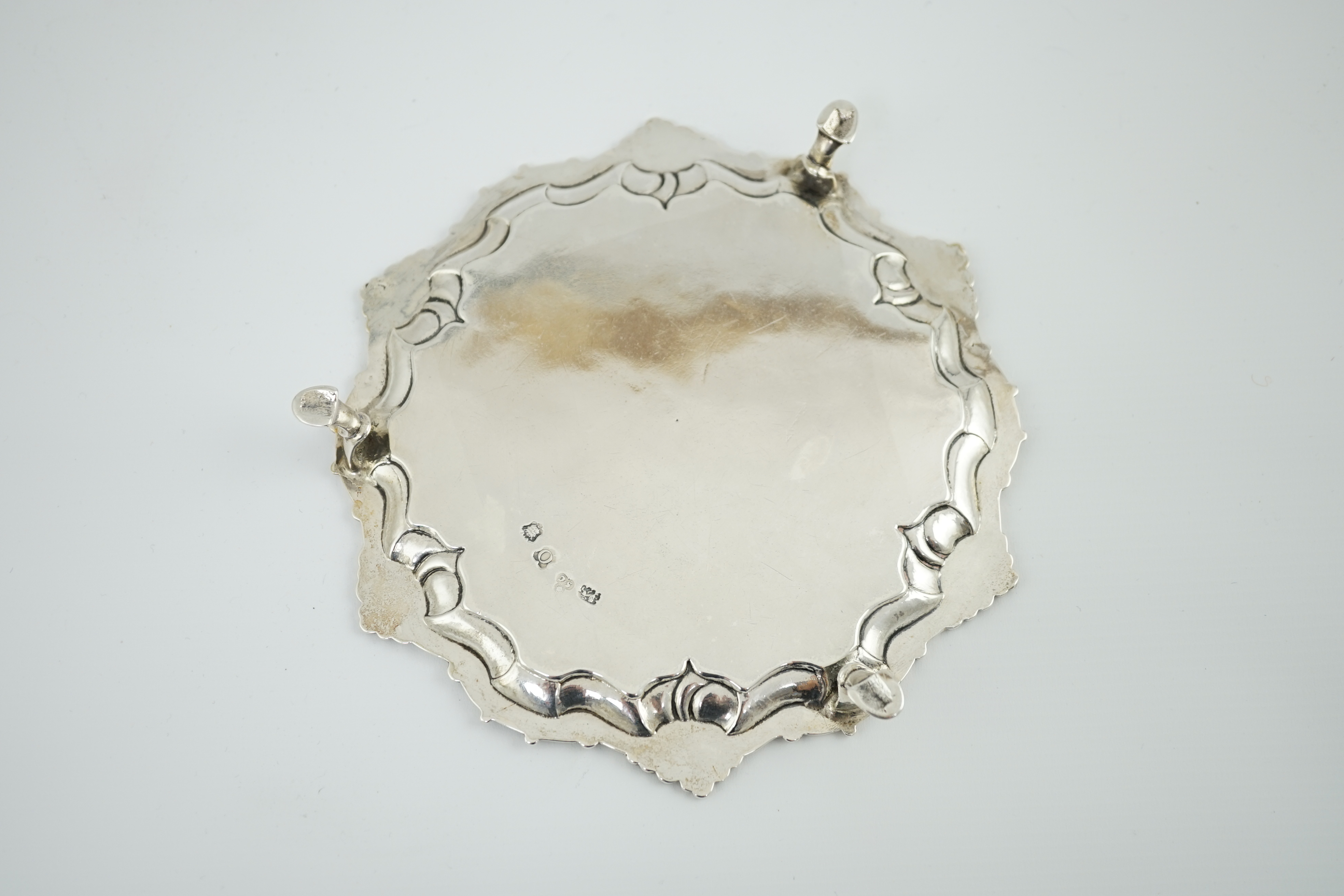 A George II silver waiter, by Samuel Courtauld